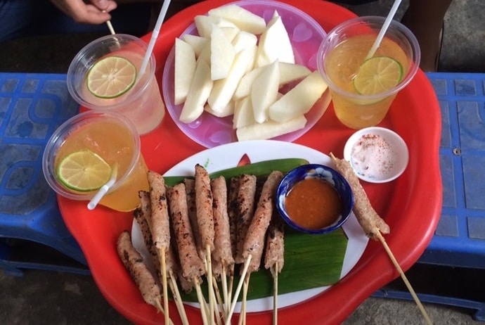 grilled fermented pork roll - nem nuong co phuong