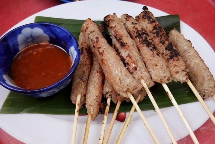 grilled fermented pork roll - nem nuong xuan dan