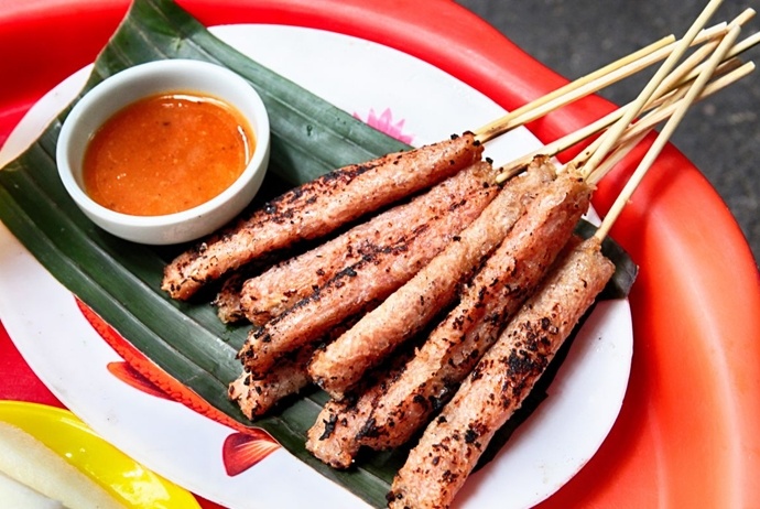 grilled fermented pork roll - nem nuong yen beo